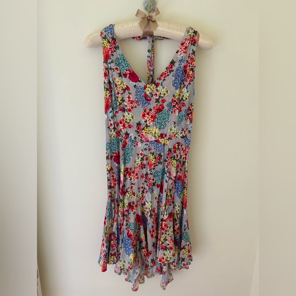 Free People “Vivian” Halter Slip Dress 
Size: Medium 
NWOT